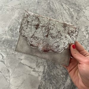 Anthropologie silver clutch NWOT